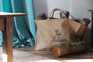 Séjour Panier à bois Gite Le Nichoir
